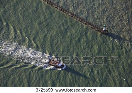 France, Pas de Calais, Calais, aerial view, boat getting out the harbor. View Large Photo Image Stock Image - France, Pas de Calais, Calais, aerial view, boat getting out the harbor.. Fotosearch