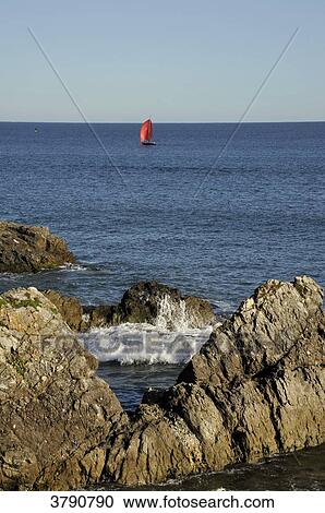 France, Pays de la Loire region, Loire-Atlantique department, small ship cruising off the wild coast at Le Pouliguen on Atlantic coast. View Large Photo Image Stock Image - France, Pays de la Loire region, Loire-Atlantique department, small ship cruising off the wild coast at Le Pouliguen on Atlantic coast.. Fotosearch