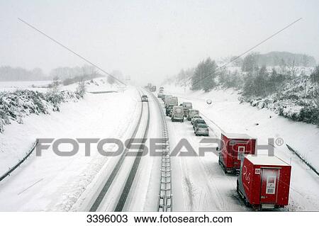 Stock Image - France, Reccurrent traffic problem on the highway in winter due to the first snow falls. Fotosearch
