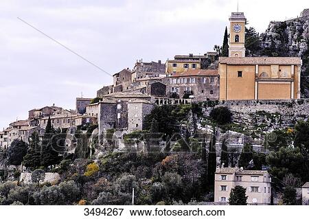 Stock Photo - France, South-Eastern France, Eze, old seaside villages perched on the hills in the Massif des Maures and in the Massif de l'Esterel, artists' village. Fotosearch