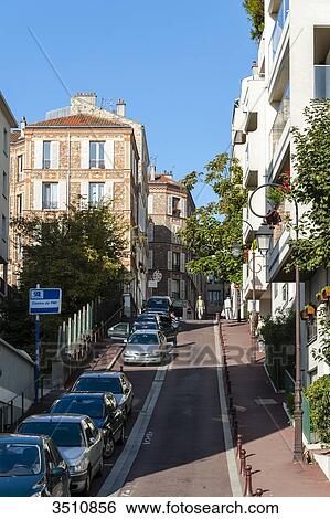 Stock Photograph - France, suburbs of Paris, Saint Cloud, street in summer. Fotosearch
