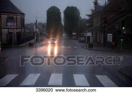 France, Traffic problem in bad weather, heavy rains and deluge. river's water flow problem on the road View Large Photo Image Stock Image - France, Traffic problem in bad weather, heavy rains and deluge. river's water flow problem on the road. Fotosearch