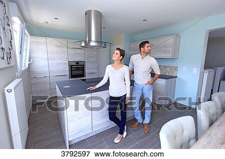 France, young couple in their new house. View Large Photo Image Stock Photo - France, young couple in their new house.. Fotosearch