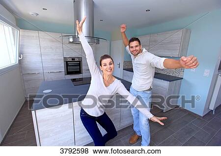 France, young couple in their new house. View Large Photo Image Stock Photo - France, young couple in their new house.. Fotosearch