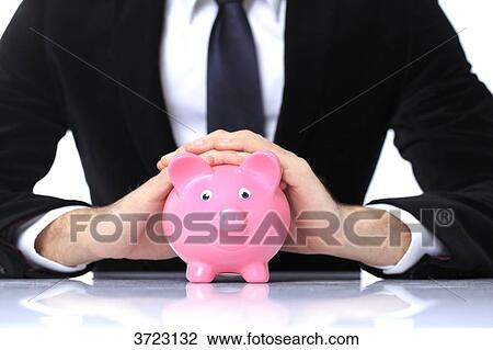 France, young man in costume, money boxe on a table in front of him. View Large Photo Image Stock Image - France, young man in costume, money boxe on a table in front of him.. Fotosearch
