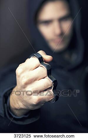 France, young man with brass knuckles View Large Photo Image Stock Photography - France, young man with brass knuckles. Fotosearch