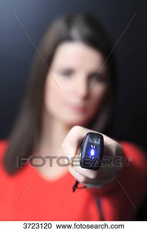 France, young woman with electric shocker View Large Photo Image Stock Image - France, young woman with electric shocker. Fotosearch