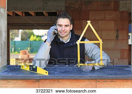 France, young working person in a house in construction. View Large Photo Image Stock Image - France, young working person in a house in construction.. Fotosearch