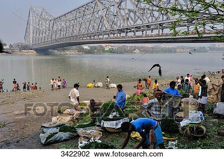 India, Kolkata, crossing of the Hooghly River, traditional flower market near the Howrah bridge View Large Photo Image Stock Image - India, Kolkata, crossing of the Hooghly River, traditional flower market near the Howrah bridge. Fotosearch