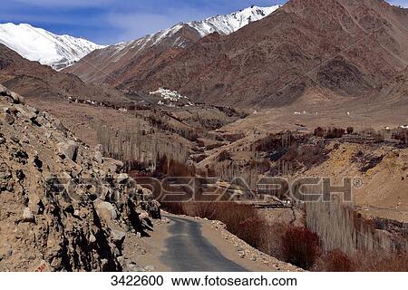 India, Ladakh, Indian State Jammu and Kashmir, mountain landscape between Yangtang and Leh. In the background: monastery on a rocky peak View Large Photo Image Stock Image - India, Ladakh, Indian State Jammu and Kashmir, mountain landscape between Yangtang and Leh. In the background: monastery on a rocky peak. Fotosearch