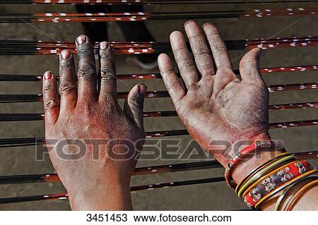 India, Orissa, Badbadi weaver village, Baragarh district, hands stained with dye View Large Photo Image Stock Image - India, Orissa, Badbadi weaver village, Baragarh district, hands stained with dye. Fotosearch