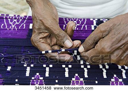 Stock Photo - India, Orissa, Baragarh district, Badbadi village, weaver village. Fotosearch