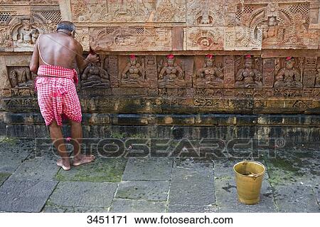 India, Orissa, Bhubaneswar, Parsurameswara temple, 7th Century, Brahman performing a ritual View Large Photo Image Stock Image - India, Orissa, Bhubaneswar, Parsurameswara temple, 7th Century, Brahman performing a ritual. Fotosearch