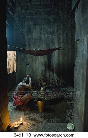 India, Orissa, Bhubaneswar, Parsurameswara temps, 7th Century, priest performing a ritual View Large Photo Image Stock Image - India, Orissa, Bhubaneswar, Parsurameswara temps, 7th Century, priest performing a ritual. Fotosearch