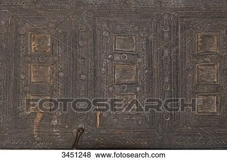 India, Orissa, Koraput district, detail of the curved door of a Kuvi Kondk house View Large Photo Image Stock Photo - India, Orissa, Koraput district, detail of the curved door of a Kuvi Kondk house. Fotosearch
