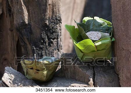 India, Orissa, Koraput district, rice offerings wrapped in leaves View Large Photo Image Picture - India, Orissa, Koraput district, rice offerings wrapped in leaves. Fotosearch