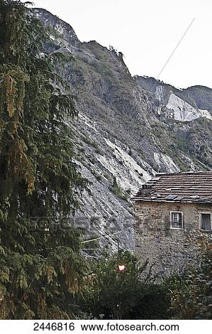 Italy, Tuscany, marble mountain near the village of Collona View Large Photo Image Stock Photograph - Italy, Tuscany, marble mountain near the village of Collona. Fotosearch