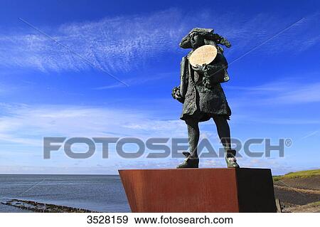 Nederlands. Wadden Islands archipelago. Vlieland island. Oost-Vlieland. Statue of Willem de Vlamingh (Trudi) View Large Photo Image Stock Photo - Nederlands. Wadden Islands archipelago. Vlieland island. Oost-Vlieland. Statue of Willem de Vlamingh (Trudi). Fotosearch