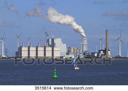 Netherlands, Groningen province, Eemshaven or Ems Harbour is a seaport. Ems estuary. Eemshaven Electrabel poxer plant. GDF Suez subsidiary. View Large Photo Image Picture - Netherlands, Groningen province, Eemshaven or Ems Harbour is a seaport. Ems estuary. Eemshaven Electrabel poxer plant. GDF Suez subsidiary.. Fotosearch