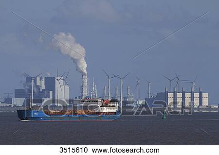 Netherlands, Groningen province, Eemshaven or Ems Harbour is a seaport. Ems estuary. Eemshaven Electrabel poxer plant. GDF Suez subsidiary. View Large Photo Image Stock Image - Netherlands, Groningen province, Eemshaven or Ems Harbour is a seaport. Ems estuary. Eemshaven Electrabel poxer plant. GDF Suez subsidiary.. Fotosearch
