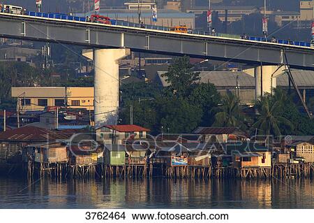 Picture - Philippinas, Cebu-City. Mandaue. The First Mactan-Mandaue spanning across the Mactan Channel and connecting the islands of Cebu and Mactan. Bridge. Fotosearch