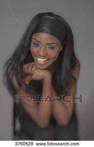 Stock Photo - Portarit of a smiling young attractive African women. Fotosearch