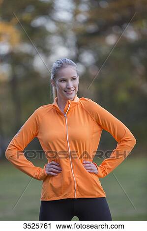 Portrait of a pretty blonde woman doing sport in park View Large Photo Image Stock Image - Portrait of a pretty blonde woman doing sport in park. Fotosearch
