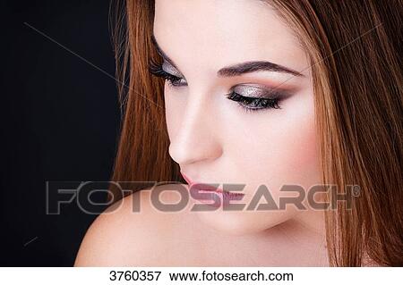 Portrait of a pretty girl with silver makeup View Large Photo Image Stock Photo - Portrait of a pretty girl with silver makeup. Fotosearch