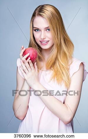 Portrait of a smiling young woman fishing in hands View Large Photo Image Stock Photograph - Portrait of a smiling young woman fishing in hands. Fotosearch