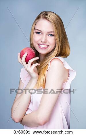 Portrait of a smiling young woman fishing in hand View Large Photo Image Stock Photography - Portrait of a smiling young woman fishing in hand. Fotosearch