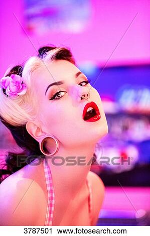 Portrait of a young Pin Up profile, mouth open, looking at camera View Large Photo Image Stock Image - Portrait of a young Pin Up profile, mouth open, looking at camera. Fotosearch