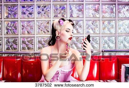 Portrait of a young Pin Up profile, making up View Large Photo Image Stock Image - Portrait of a young Pin Up profile, making up. Fotosearch