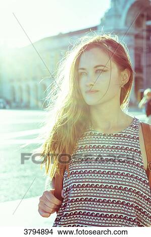 Portrait of a young woman face, against the light, on the Place du Commerce, Lisbon, Portugal View Large Photo Image Picture - Portrait of a young woman face, against the light, on the Place du Commerce, Lisbon, Portugal. Fotosearch