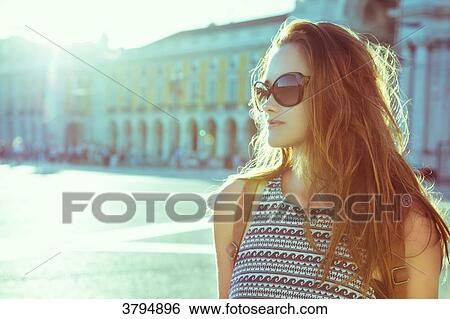 Portrait of a young woman in profile, against the light, on the Place du Commerce, Lisbon, Portugal View Large Photo Image Stock Photograph - Portrait of a young woman in profile, against the light, on the Place du Commerce, Lisbon, Portugal. Fotosearch