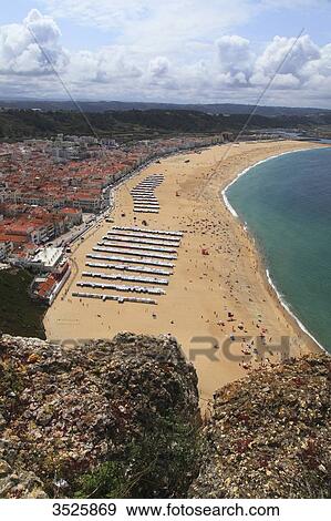 Portugal, Nazare. Nazare beach and its beach tents. View Large Photo Image Stock Photo - Portugal, Nazare. Nazare beach and its beach tents.. Fotosearch