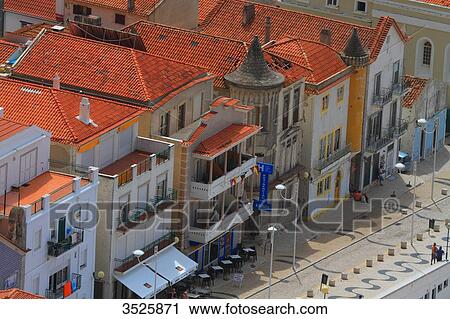 Stock Image - Portugal, Nazare. Seafront houses.. Fotosearch