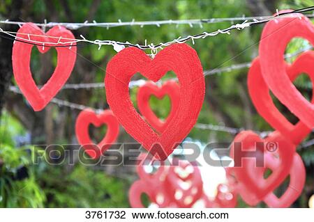 Red hearts in garland during Chinese new year. View Large Photo Image Stock Image - Red hearts in garland during Chinese new year.. Fotosearch