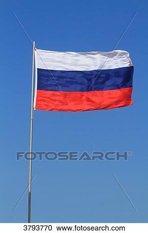 Russian flag in blue sky. View Large Photo Image Stock Image - Russian flag in blue sky.. Fotosearch