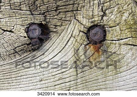 Rusted bolts in the piece of bolt of a buffer View Large Photo Image Picture - Rusted bolts in the piece of bolt of a buffer. Fotosearch