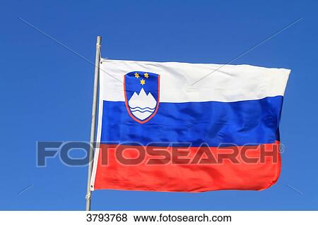 Stock Photo - Slovenian flag in blue sky.. Fotosearch