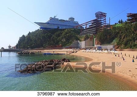 South Korea. Gangwon area. Jeongdongjin, also Chongdongjin, near Gangneung. Sun Cruise hotel. View Large Photo Image Stock Photo - South Korea. Gangwon area. Jeongdongjin, also Chongdongjin, near Gangneung. Sun Cruise hotel.. Fotosearch