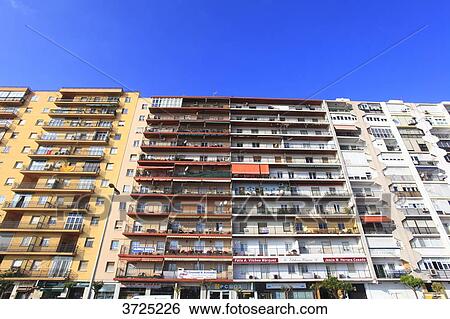 Stock Photograph - Spain, Andalousia. Algeciras. Buildings on seaside. Fotosearch