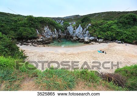 Spain. Catalonia. Llanes, Naves. Playa De Gulpiyuri. View Large Photo Image Stock Photography - Spain. Catalonia. Llanes, Naves. Playa De Gulpiyuri.. Fotosearch