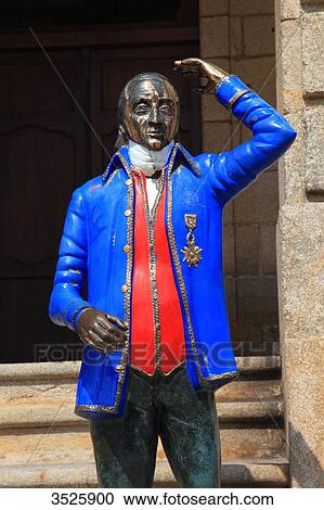 Stock Image - Spain, Galicia. Ribadeo. Historical centre. Staue of Marquis de Sargadelos in front of Pazo de Ibanez, Ribadeo city hall.. Fotosearch