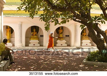 Stock Photography - Thailand, Nakhon Pathom, Monk in Phra Pathom Chedi temple. Fotosearch