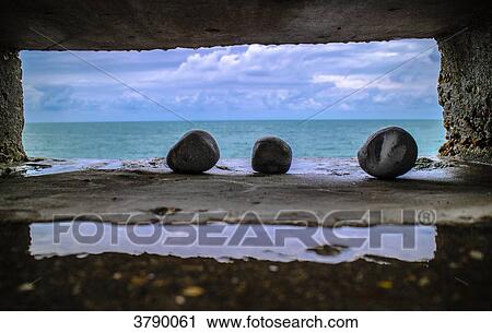 Stock Image - The three stones trough a window. Fotosearch