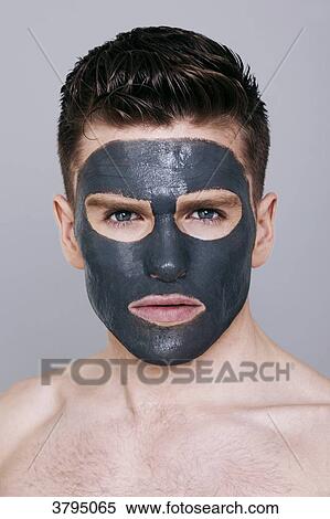 topless man, facemask on, looking at camera, serious View Large Photo Image Stock Photography - topless man, facemask on, looking at camera, serious. Fotosearch