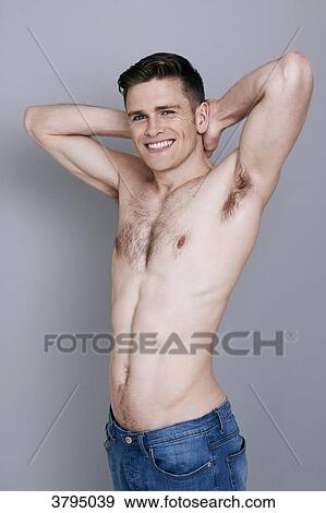 topless man, hands behind his head, arms up, wearing jeans, smiling View Large Photo Image Stock Photo - topless man, hands behind his head, arms up, wearing jeans, smiling. Fotosearch