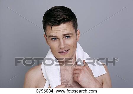 topless man, towel around his neck, small smile, forehead creased View Large Photo Image Picture - topless man, towel around his neck, small smile, forehead creased. Fotosearch