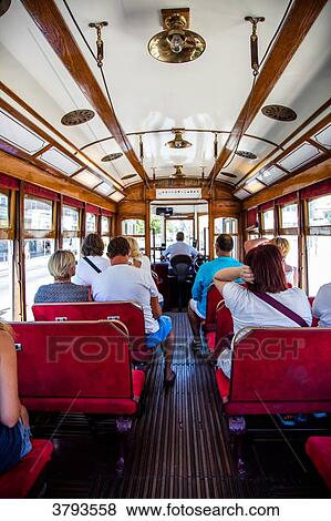 Stock Photo - Tourists in a tram, Lisbon, Portugal. Fotosearch